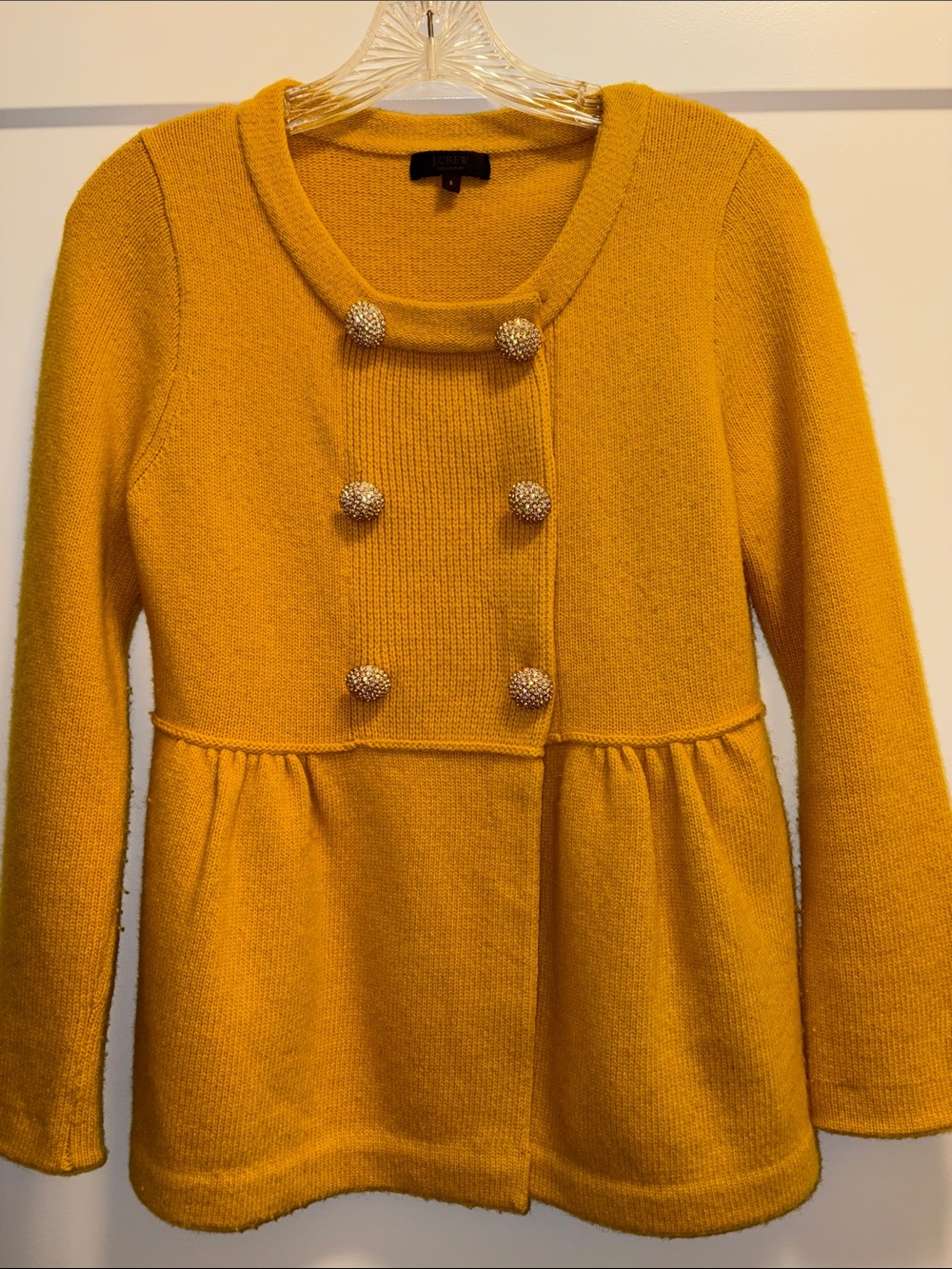 J. Crew cashmere Yellow Knit Peplum style with Decorative rhinestone buttons